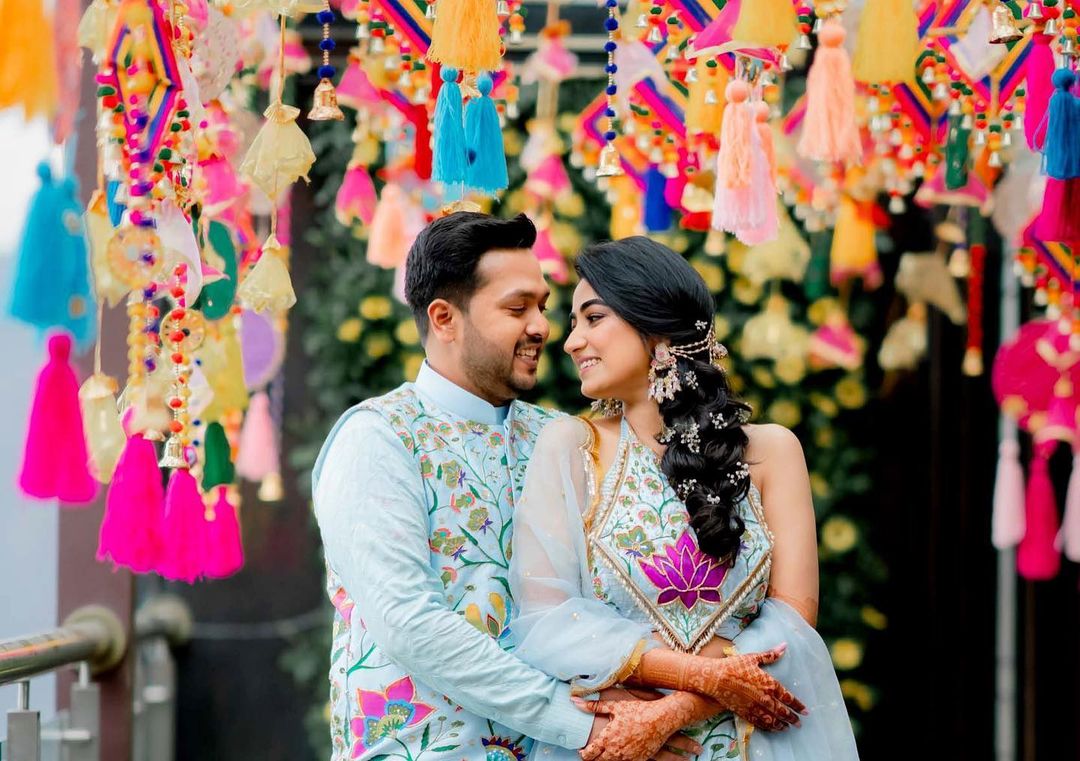 bride who had handpainted her mehendi outfit